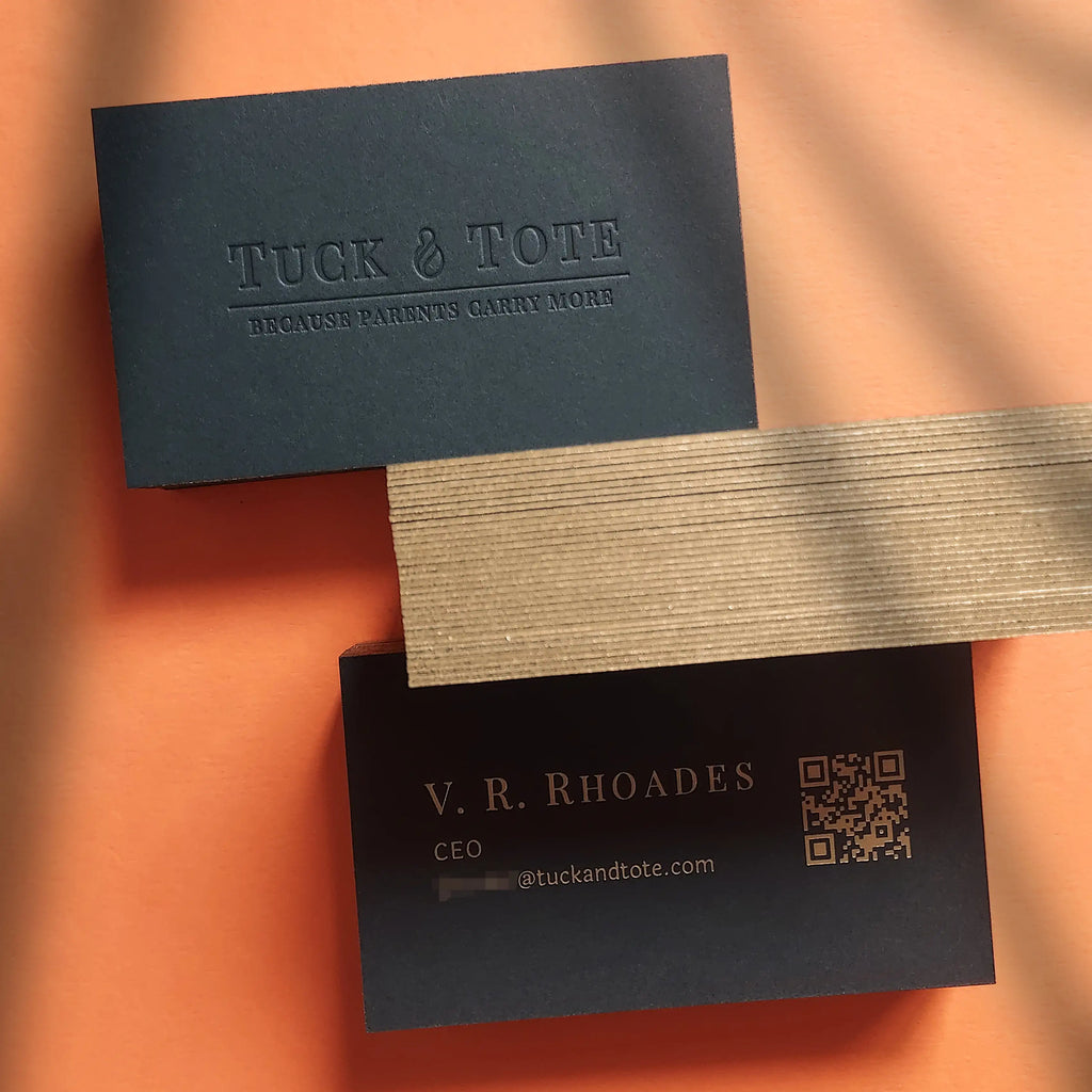 38pt black business card with gold foil and gold-painted edges, featuring deep debossing and premium finish.