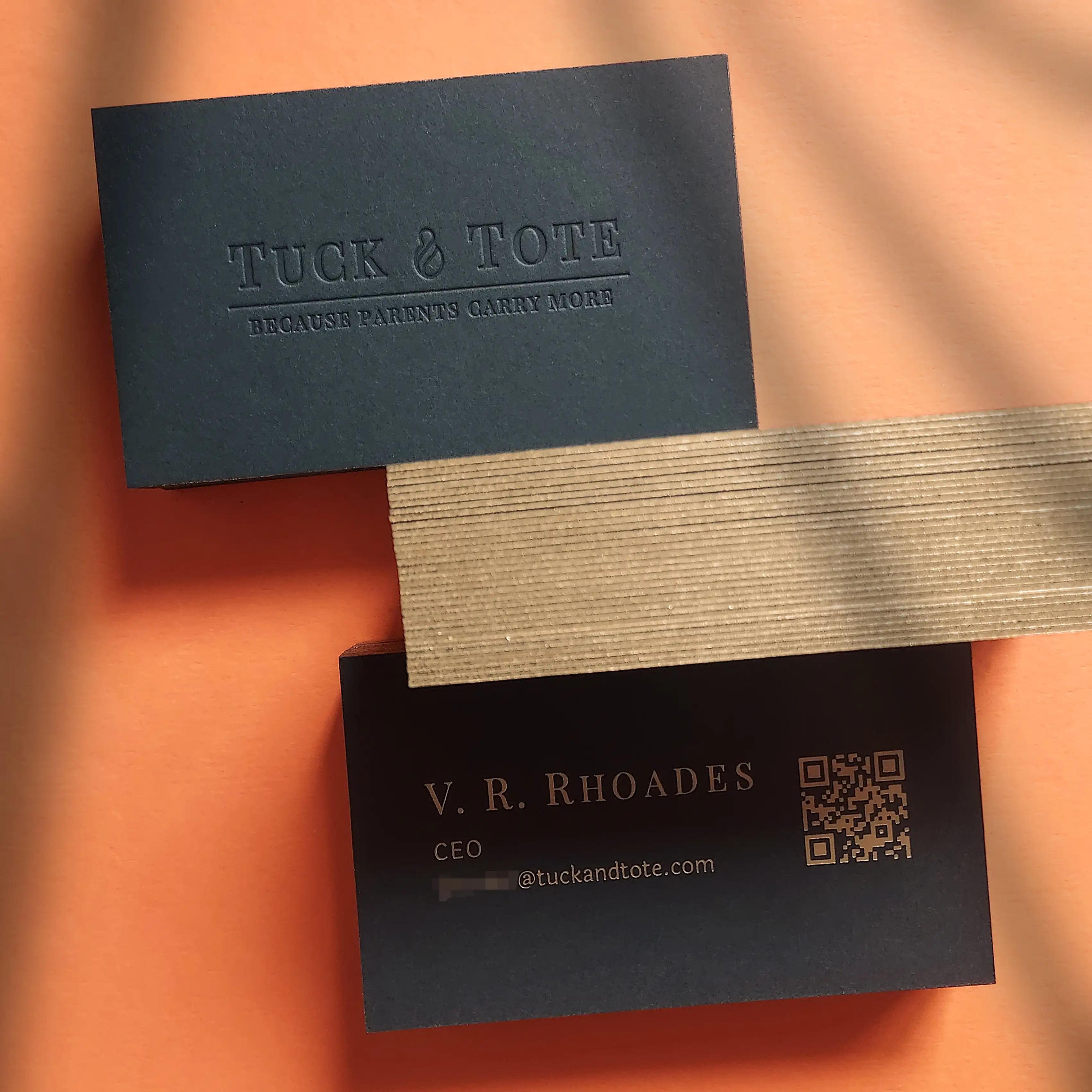 38pt black business card with gold foil and gold-painted edges, featuring deep debossing and premium finish.